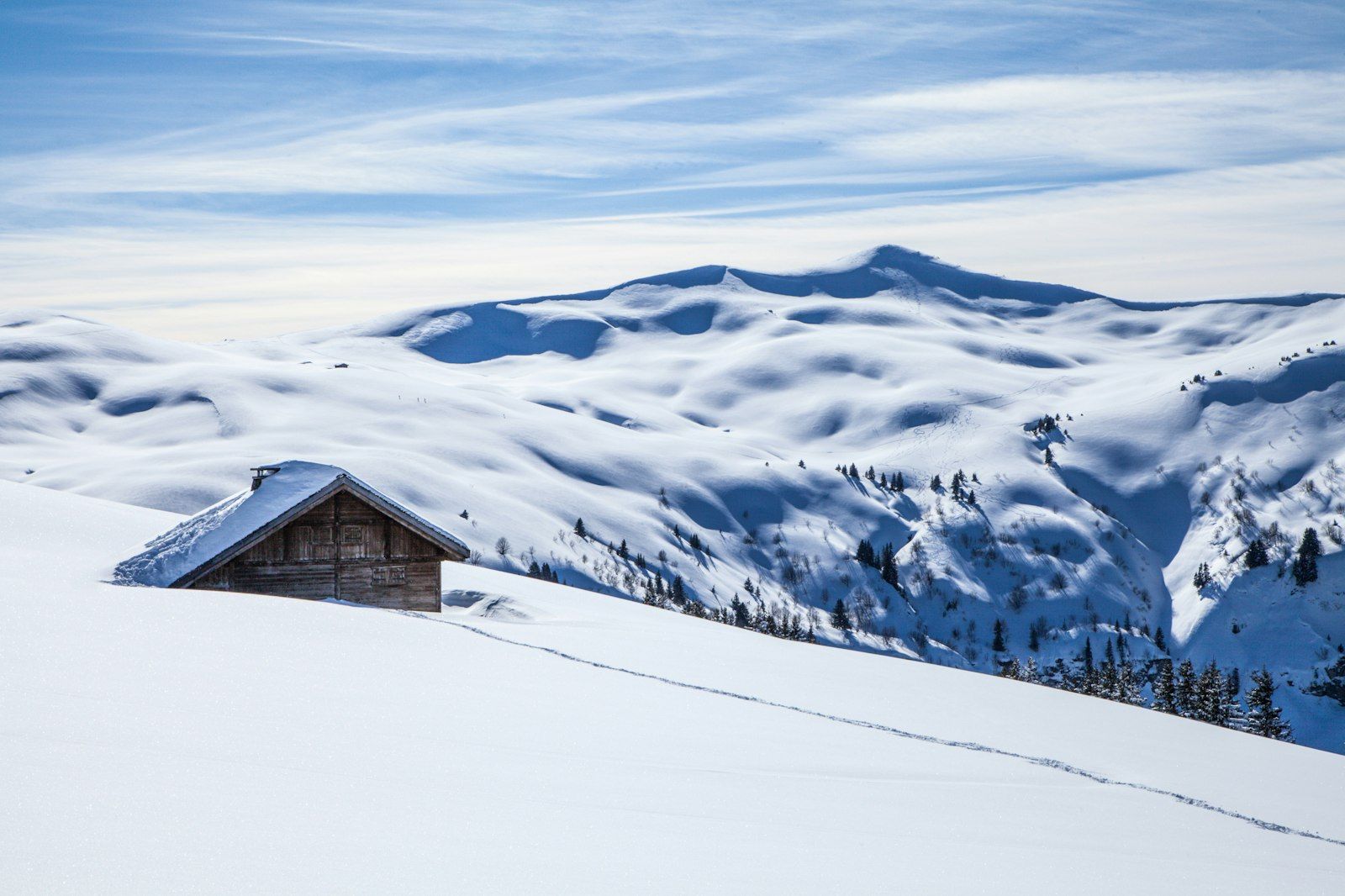 Chalet de montagne sous la neige à Megève